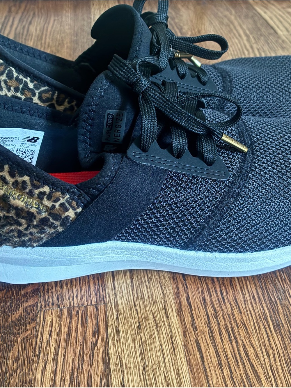 New Balance Women's Black Knit Sneaker with Leopard Collar